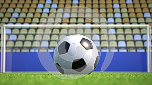 Zoom-out to a soccer ball lying on the grass in an empty stadium