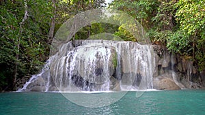 Zoom out video of Erawan water fall Second floor, tropical rainforest at Srinakarin Dam, Kanchanaburi, Thailand. Beautiful water