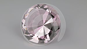 Zoom and rotation of a large pink rhinestone on a white background.