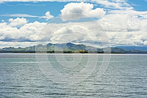 Zoom shot of the mountains and landscape of Ubay, Bohol. View from boat
