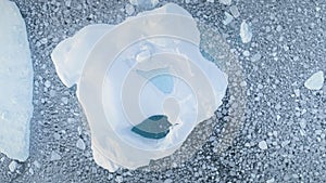 Zoom view of iceberg. Antarctica aerial flight.