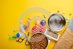 Zoomarket and pet store.Catty background, with cat accessories on a yellow background.Cat .Flat-lay