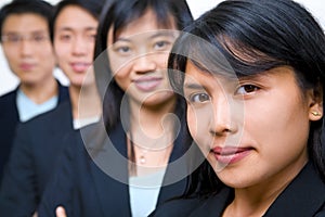 Zoomed portrait of young Asian freshmen lineup photo