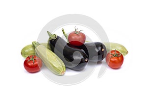 Zucchini and eggplant isolated on white background. Fresh vegetable marrow isolated on white background. Tomatoes , zucchini, eggp