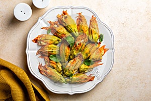 Zucchini Flowers stuffed with ricotta cheese, egg and bread crumbs