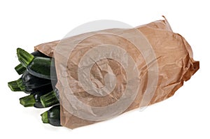 Zucchini paper bag on white background photo