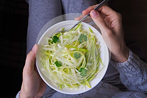 Zucchini raw vegan pasta with on plate. Vegetarian healthy food