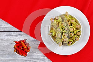 Zucchini rolls filling with herring slices