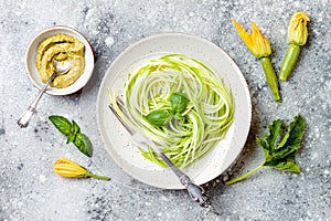 Zucchini spaghetti with basil. Vegetarian vegetable low carb pasta. Zucchini noodles or zoodles