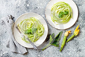 Zucchini spaghetti with basil. Vegetarian vegetable low carb pasta. Zucchini noodles or zoodles