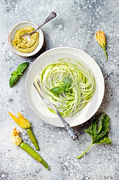 Zucchini spaghetti with basil. Vegetarian vegetable low carb pasta. Zucchini noodles or zoodles