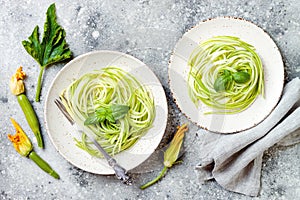 Zucchini spaghetti with basil. Vegetarian vegetable low carb pasta. Zucchini noodles or zoodles