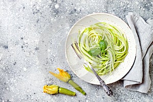 Zucchini spaghetti with basil. Vegetarian vegetable low carb pasta. Zucchini noodles or zoodles