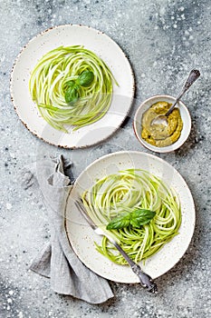 Zucchini spaghetti with basil. Vegetarian vegetable low carb pasta. Zucchini noodles or zoodles