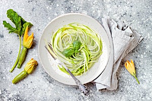 Zucchini spaghetti with basil. Vegetarian vegetable low carb pasta. Zucchini noodles or zoodles