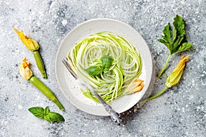 Zucchini spaghetti with basil. Vegetarian vegetable low carb pasta. Zucchini noodles or zoodles