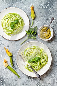 Zucchini spaghetti with basil. Vegetarian vegetable low carb pasta. Zucchini noodles or zoodles