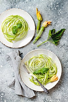 Zucchini spaghetti with basil. Vegetarian vegetable low carb pasta. Zucchini noodles or zoodles