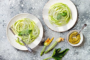 Zucchini spaghetti with basil. Vegetarian vegetable low carb pasta. Zucchini noodles or zoodles