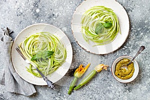 Zucchini spaghetti with basil. Vegetarian vegetable low carb pasta. Zucchini noodles or zoodles