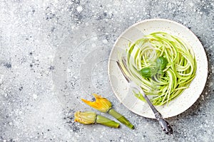 Zucchini spaghetti with basil. Vegetarian vegetable low carb pasta. Zucchini noodles or zoodles