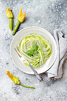 Zucchini spaghetti with basil. Vegetarian vegetable low carb pasta. Zucchini noodles or zoodles