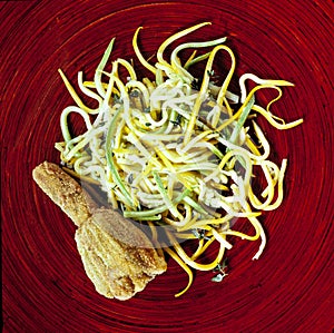 Zucchini spaghetti and flower Vegetarian vegetable low carb pasta. Zucchini noodles or zoodles.