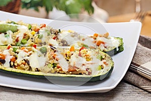 Zucchini stuffed with couscous vegetable salad