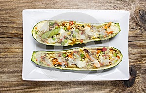 Zucchini stuffed with couscous vegetable salad