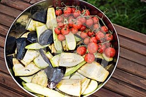 Zucchini tomatoes and aubergines