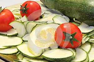Zucchini tomatoes and lemon