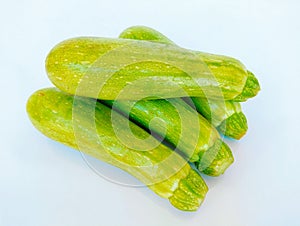 Zucchini vegetable courgette baby marrow hybrid summer squash an edible vining herbaceous plant food closeup image photo