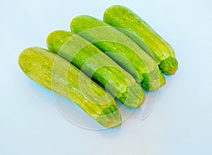 Zucchini vegetable courgette baby marrow hybrid summer squash an edible vining herbaceous plant food closeup view image photo photo