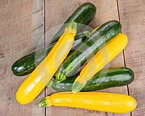 Zucchini and yellow squash on table