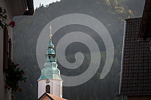 Zupnijska Cerkev Svete Elizabete Ogrske church,a typical austro hungarian slovenian catholic church with bulb steeple clocktower photo