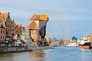 Zuraw Crane and colorful buildings on Motlawa river, Gdansk, Pol