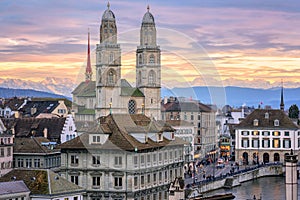 Zurich city center with snow covered Alps mountains in background, Switzerland photo