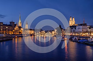 Zurich city center viewed from the river by night