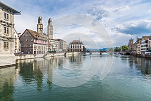 Zurich downtown with famous Grossmunster Church and river Limmat in summer, Switzerland