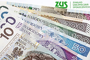 ZUS - Polish Social Insurance Institution - on the background of the Polish Zloty photo