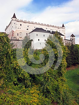 Zvolen Castle on forested hill, Slovakia