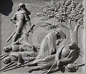 Zwingli`s death on the battlefield at Kappel, 11 October 1531., door of the Grossmunster church in Zurich photo