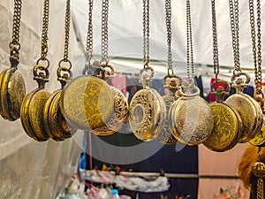 Â«Madrid,SpainÂ»; 11-11-2018: Market stall with antique chain watches