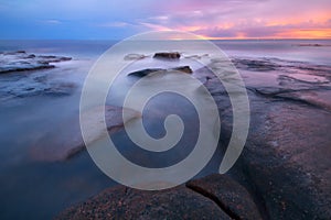 Ã¢â¬Â¨Rocks and waves at Kings Beach, QLD. photo