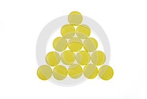 ÃÂ£ellow pills on white