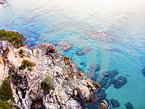 ÃÂerial view. Rocks on the coast of Lloret de Mar in a beautiful summer day,sandy beach, Costa Brava, Catalonia, Spain. photo