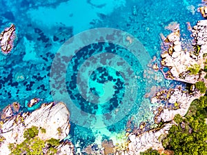 ÃÂerial view. Rocks on the coast of Lloret de Mar in a beautiful summer day,sandy beach, Costa Brava, Catalonia, Spain. photo