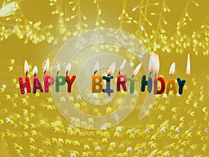 à¹‰Happy birthday candles with light on sparkle star background