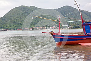 à¹‡hlaf Fishing boat on the beach