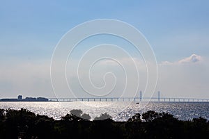 The Ã–resund bridge and glittering sea seen from MalmÃ¶ Sweden